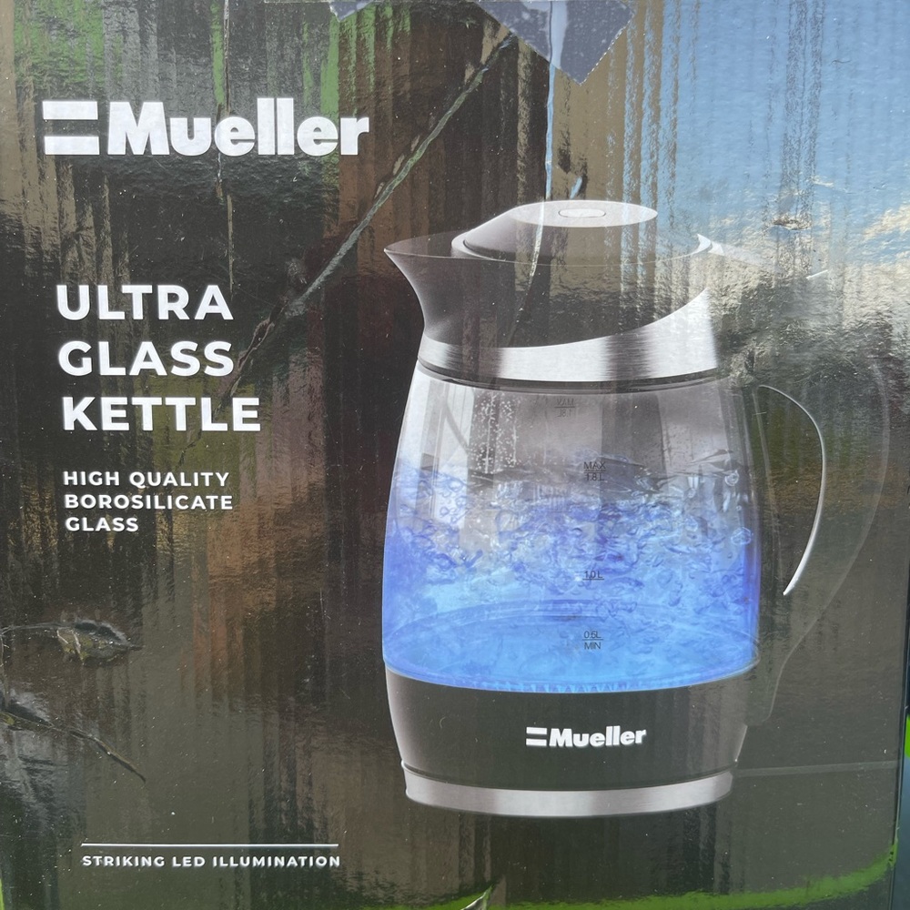 Electric glass kettle that boils water in seconds